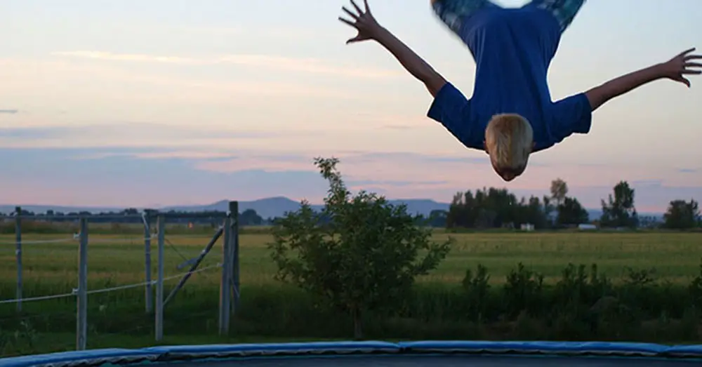 Kid Flipping on a Trampoline