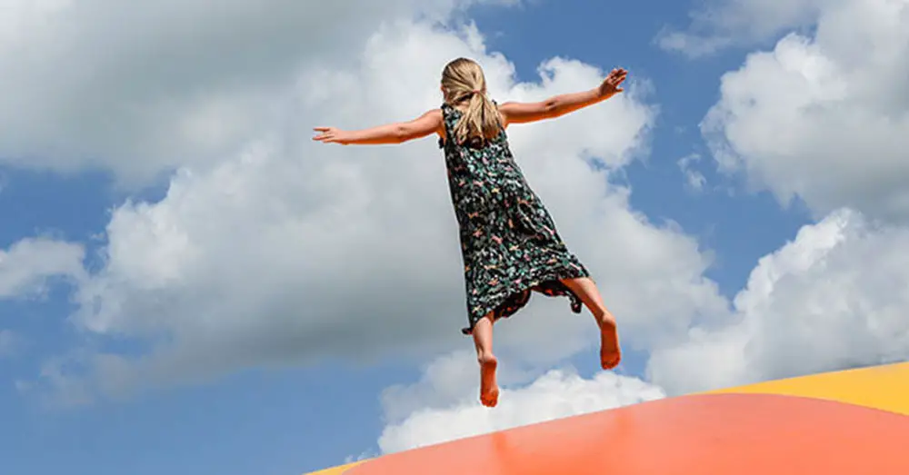 Girl Enjoying Her Time Jumping